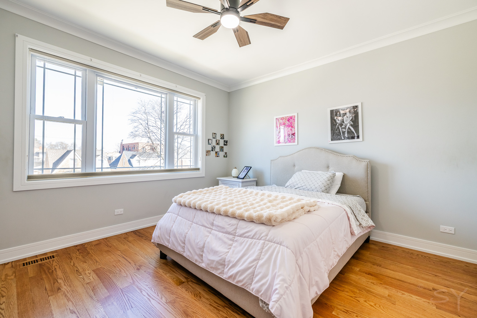 5739 West Grover Street Chicago, IL 60630 - Photo 21 of 38 a bedroom with a bed and window