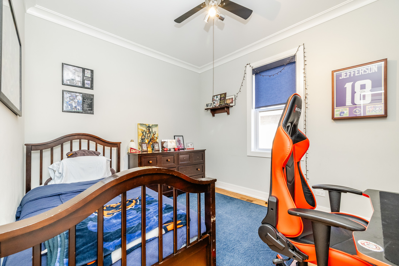 5739 West Grover Street Chicago, IL 60630 - Photo 23 of 38 a view of staircase with furniture and a window