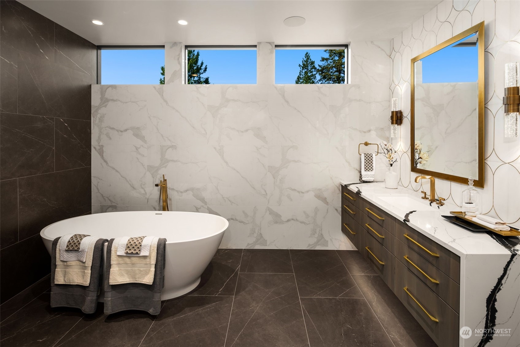 3263 Evergreen Point Road Medina, WA 98039 - Photo 19 of 37 a bathroom with a double vanity sink and a mirror