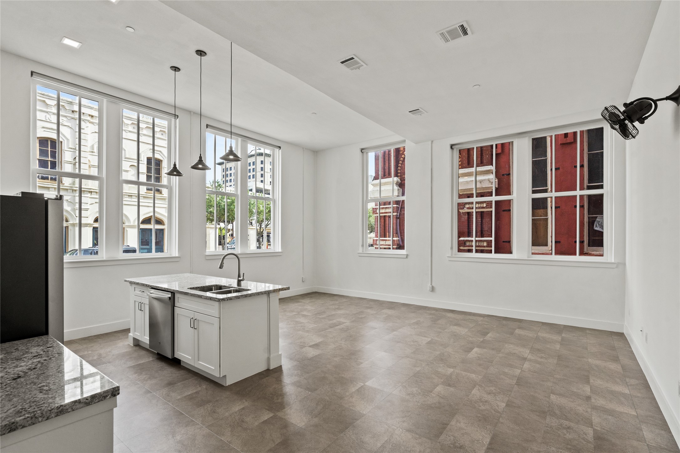 2102 Mechanic Street, Unit 101 Galveston, TX 77550 - Photo 11 of 28 a view of an empty room with a window