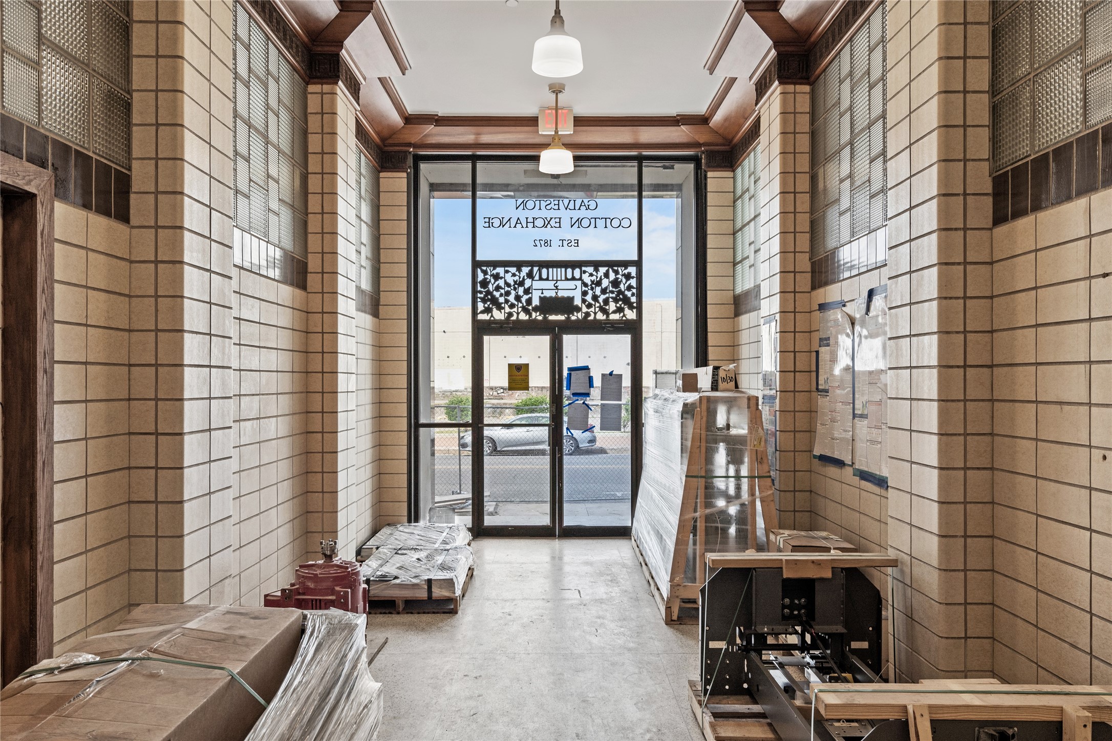 2102 Mechanic Street, Unit 101 Galveston, TX 77550 - Photo 25 of 28 a front view of a house with outdoor seating