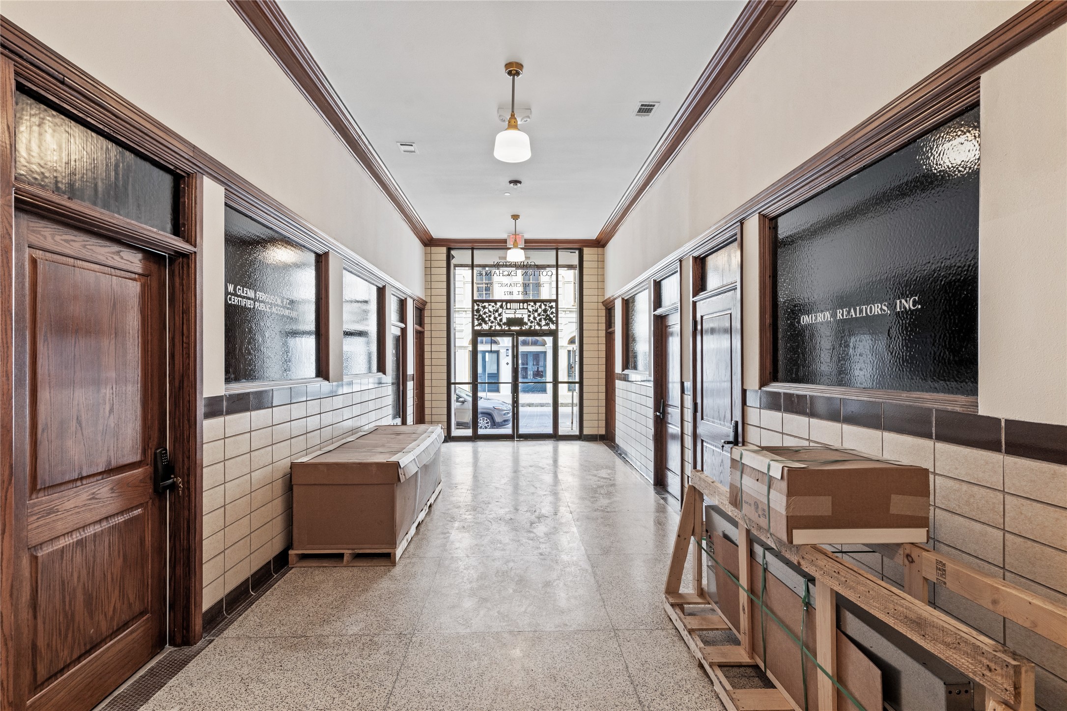 2102 Mechanic Street, Unit 101 Galveston, TX 77550 - Photo 26 of 28 a view of a hallway with an entryway and livingroom view