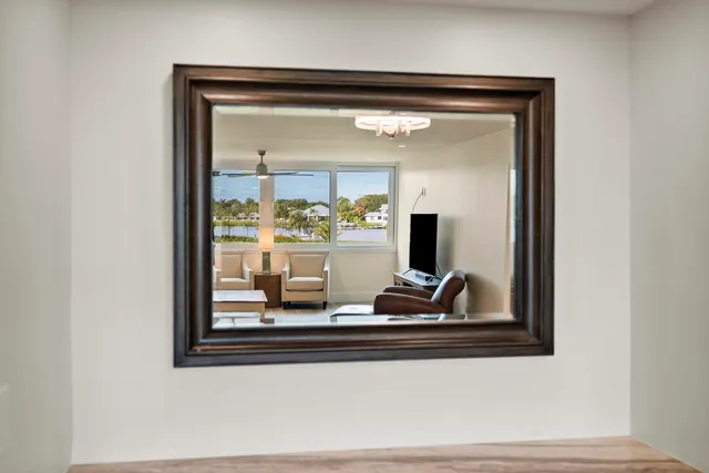 a living room with fireplace furniture and a flat screen tv