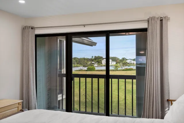 a bathroom with a granite countertop sink double and mirror