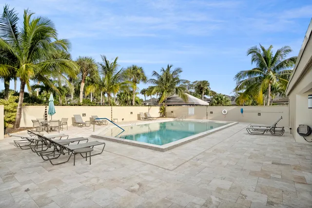 a view of a kitchen with a sink and a stove
