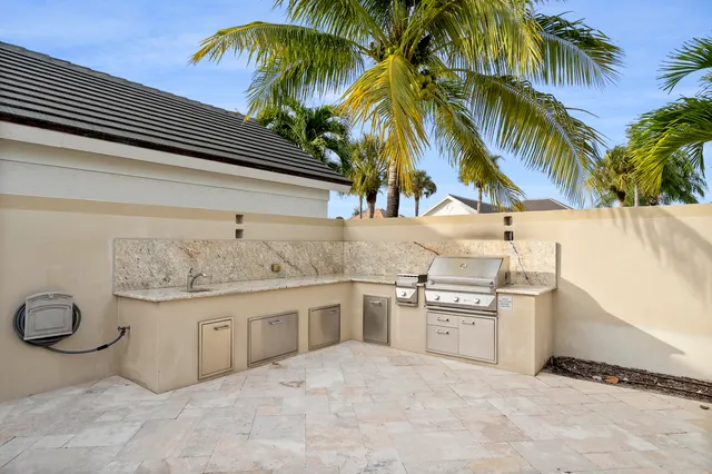 a view of living room with furniture and a clock