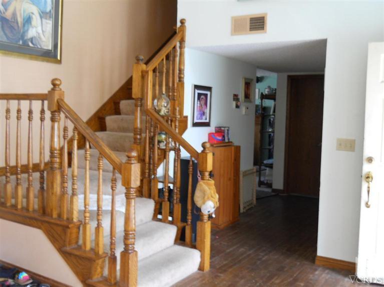 1740 Rivas Lane Oxnard, CA 93035 - Photo 2 of 30 a view of entryway and hall with wooden floor