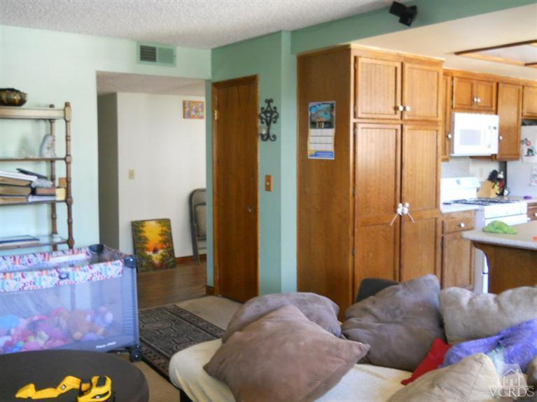 1740 Rivas Lane Oxnard, CA 93035 - Photo 11 of 30 a living room with furniture and a window