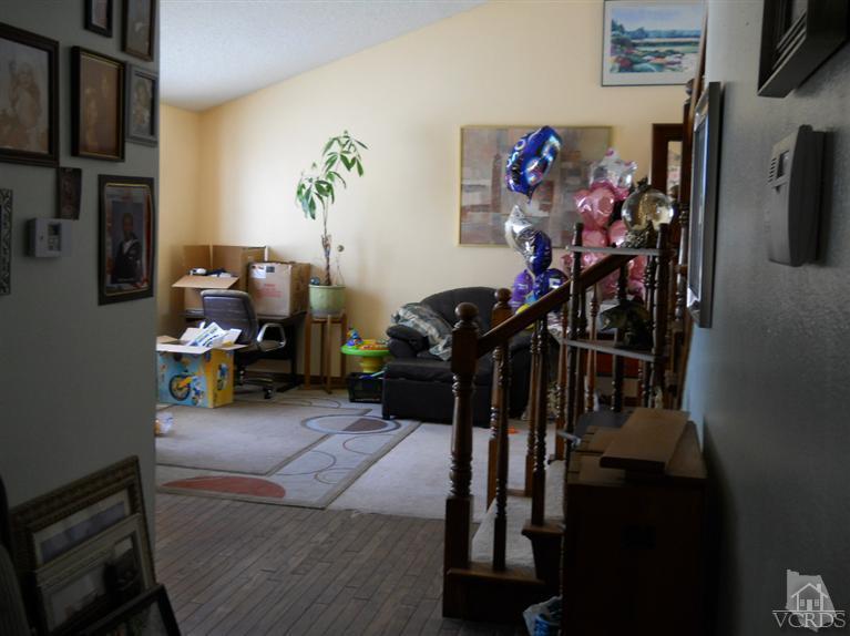 1740 Rivas Lane Oxnard, CA 93035 - Photo 13 of 30 a view of a livingroom with furniture and toys