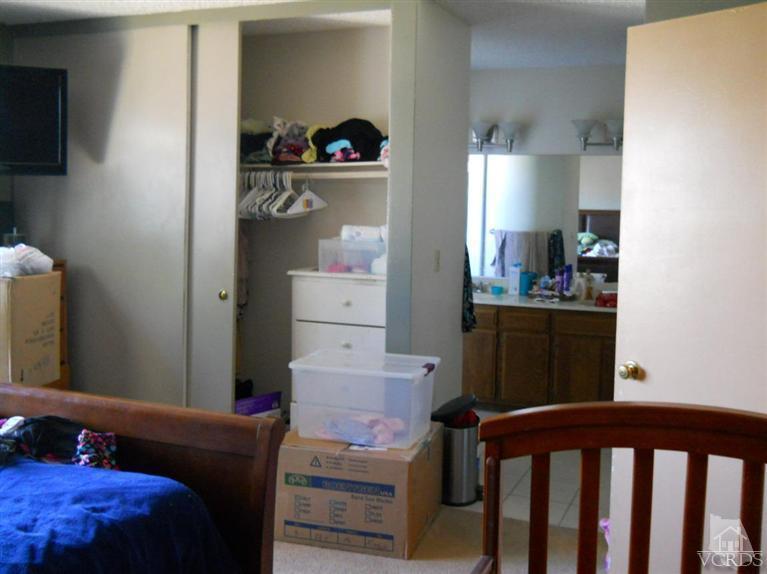 1740 Rivas Lane Oxnard, CA 93035 - Photo 16 of 30 a bedroom with furniture and a window