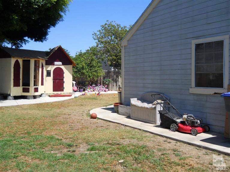 1740 Rivas Lane Oxnard, CA 93035 - Photo 28 of 30 a front view of a house with a yard