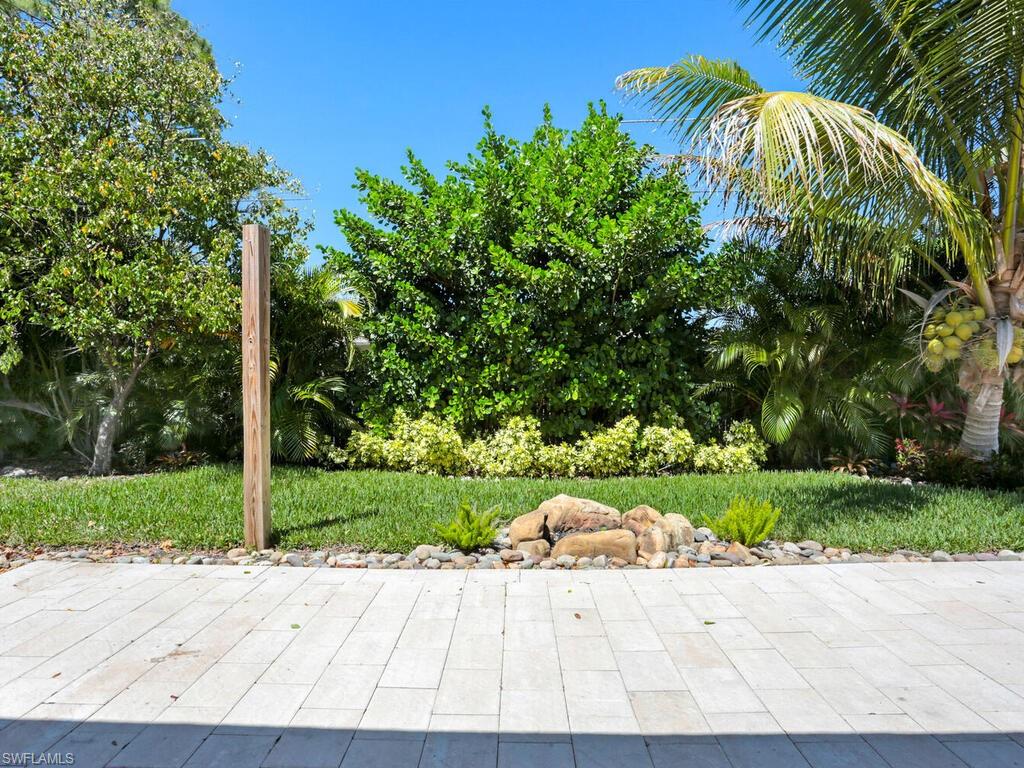 9101 Hamlin Road West Fort Myers, FL 33967 - Photo 5 of 24 a view of a garden with plants
