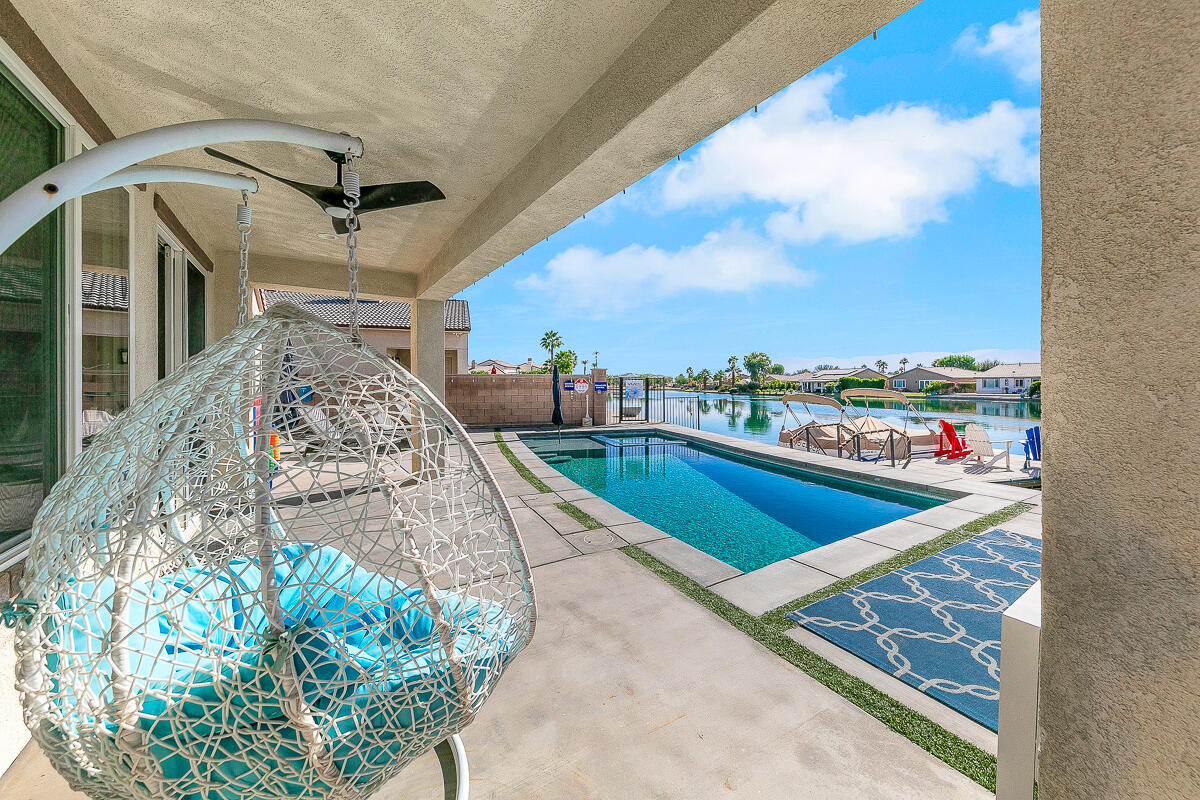 84325 Canzone Drive Indio, CA 92203 - Photo 29 of 53 a view of a balcony with furniture