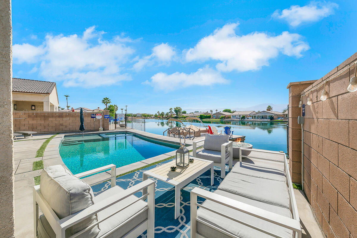 84325 Canzone Drive Indio, CA 92203 - Photo 3 of 53 a view of a terrace with chairs