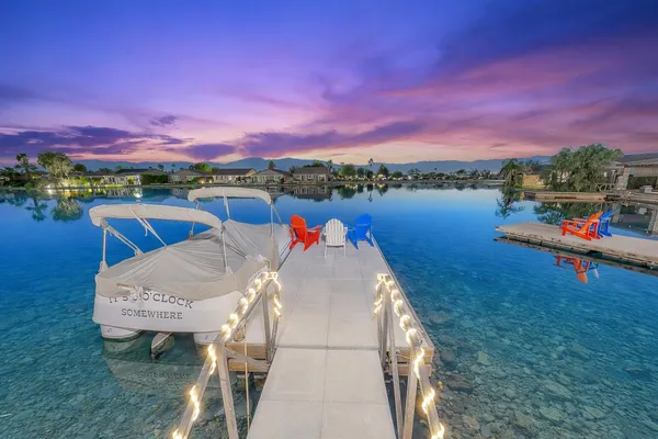 a view of a lake in front of the house