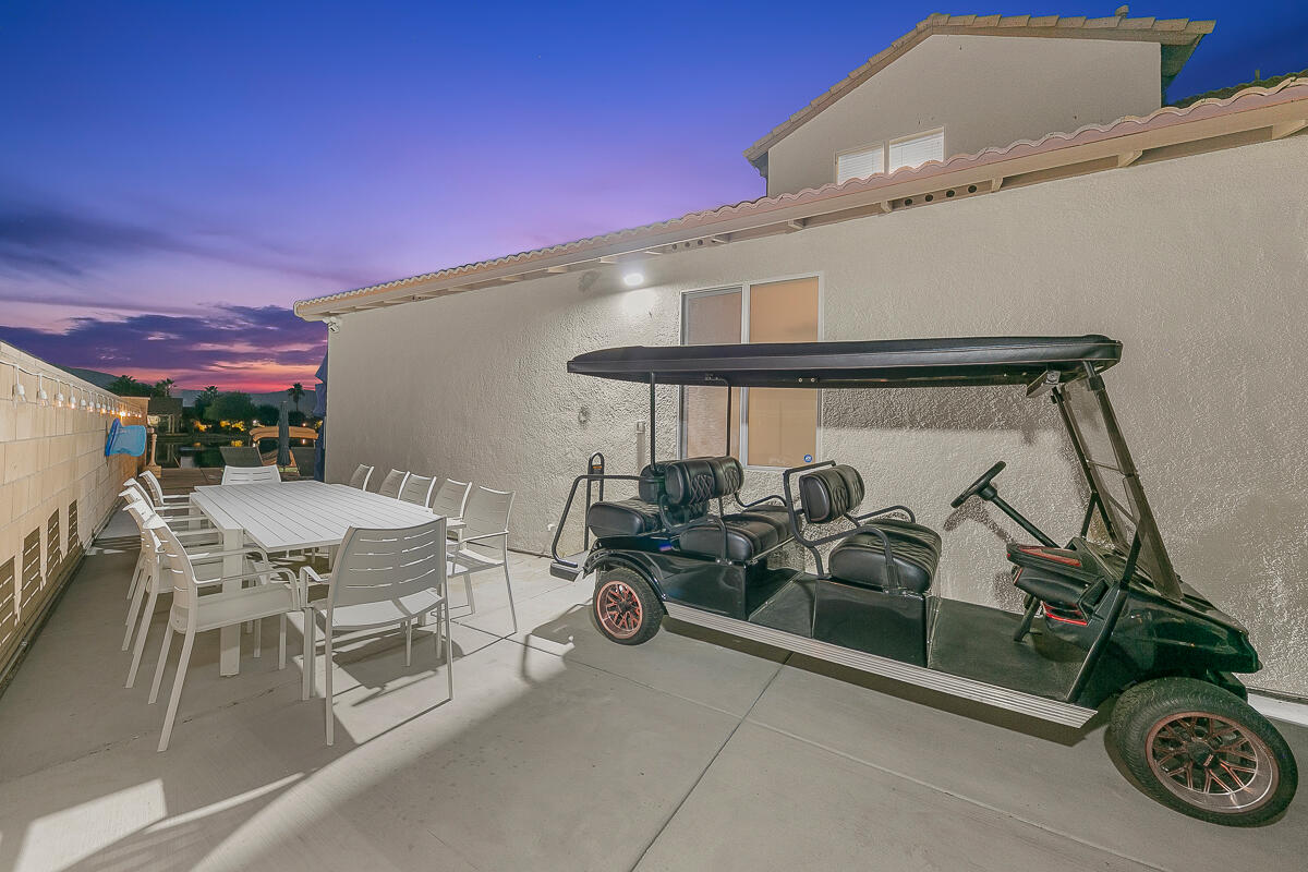 84325 Canzone Drive Indio, CA 92203 - Photo 42 of 53 a view of a chairs and table in a patio