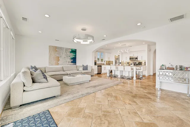 a living room with furniture and view of living room