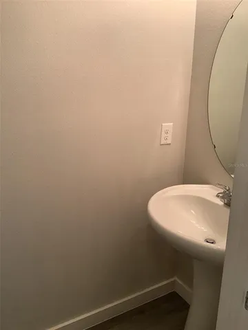 a bathroom with a toilet and a sink