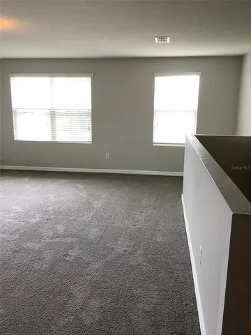 a bathroom with a toilet a sink and bathtub