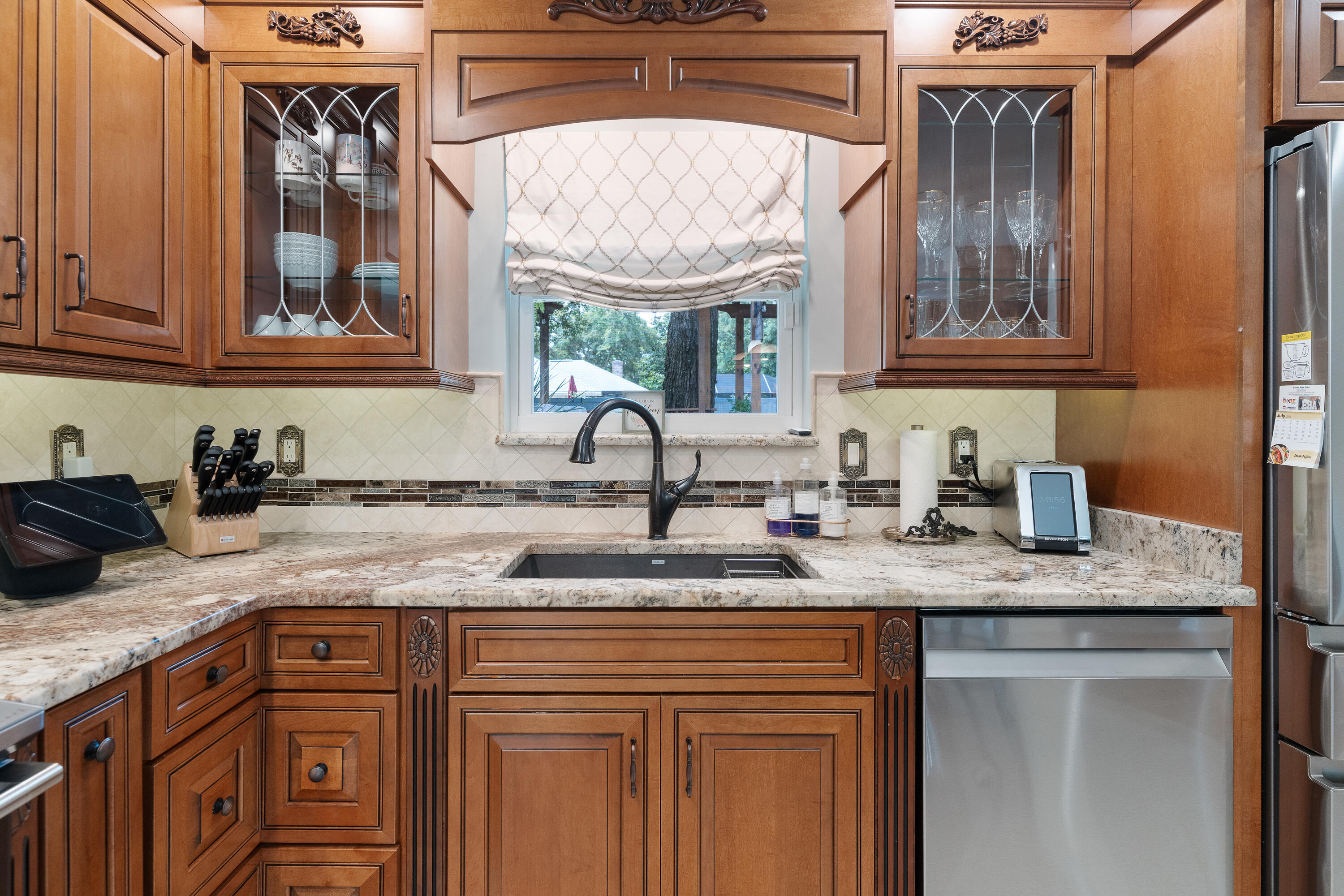 149 Raintree Boulevard Niceville, FL 32578 - Photo 15 of 72 a kitchen with stainless steel appliances granite countertop a sink and a window