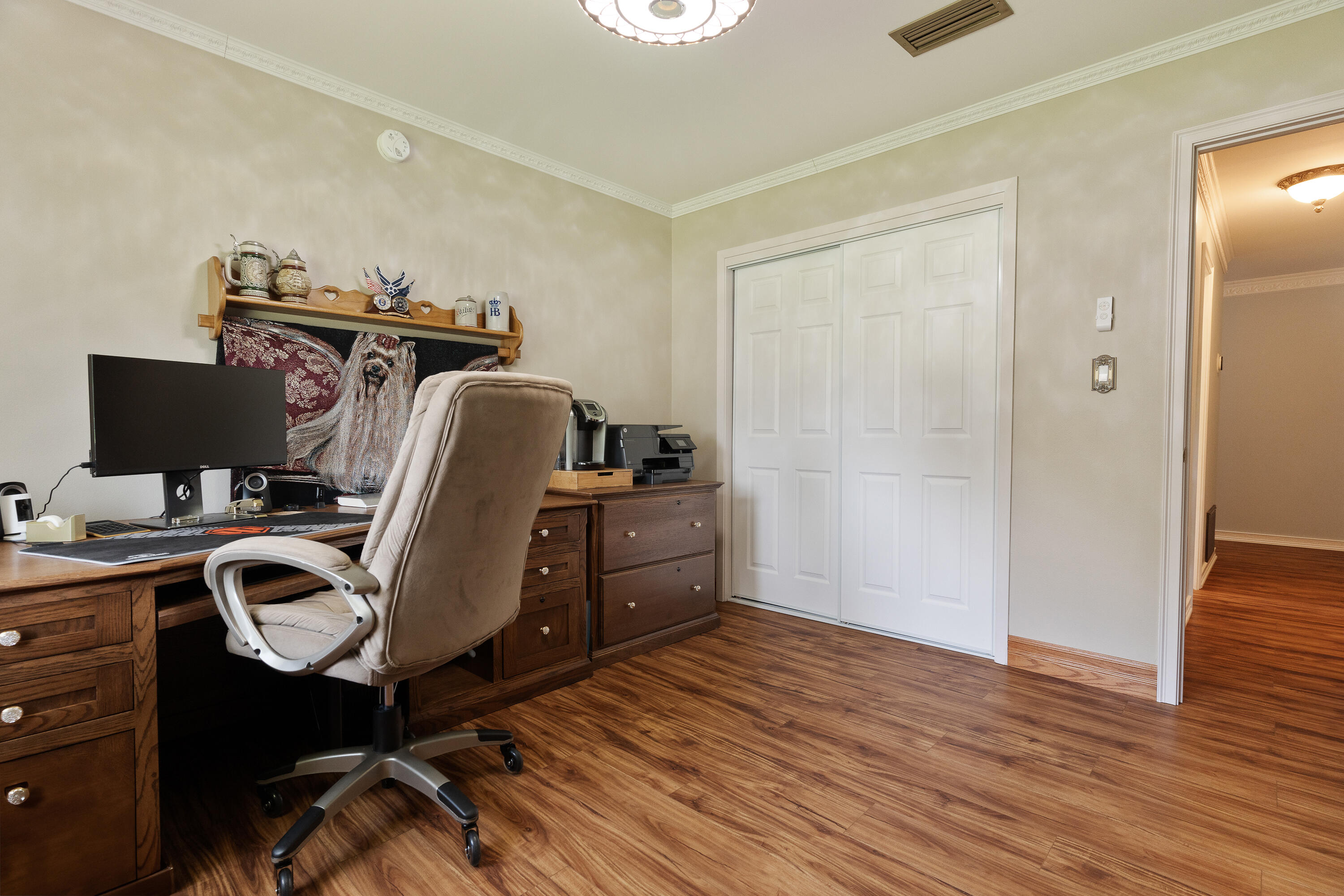 149 Raintree Boulevard Niceville, FL 32578 - Photo 40 of 72 a view of a workspace with furniture and wooden floor
