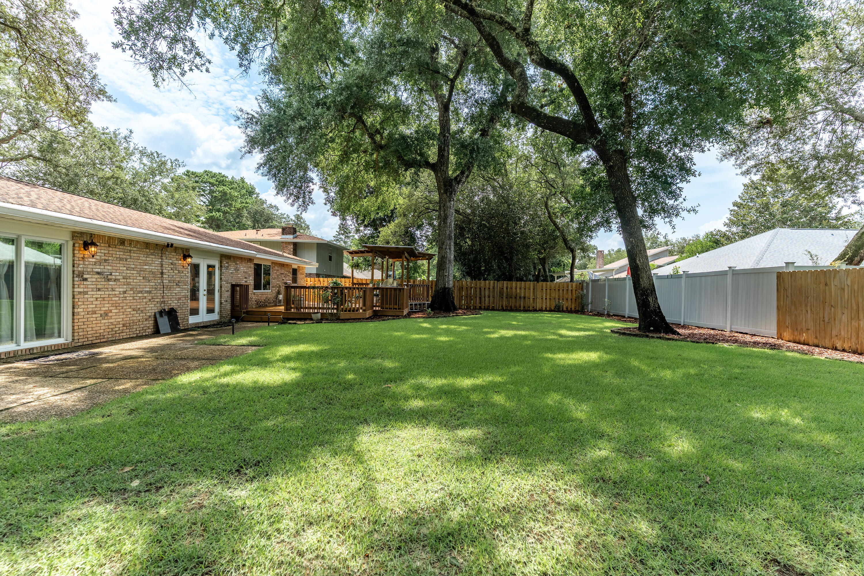 149 Raintree Boulevard Niceville, FL 32578 - Photo 47 of 72 a view of a yard in front of house