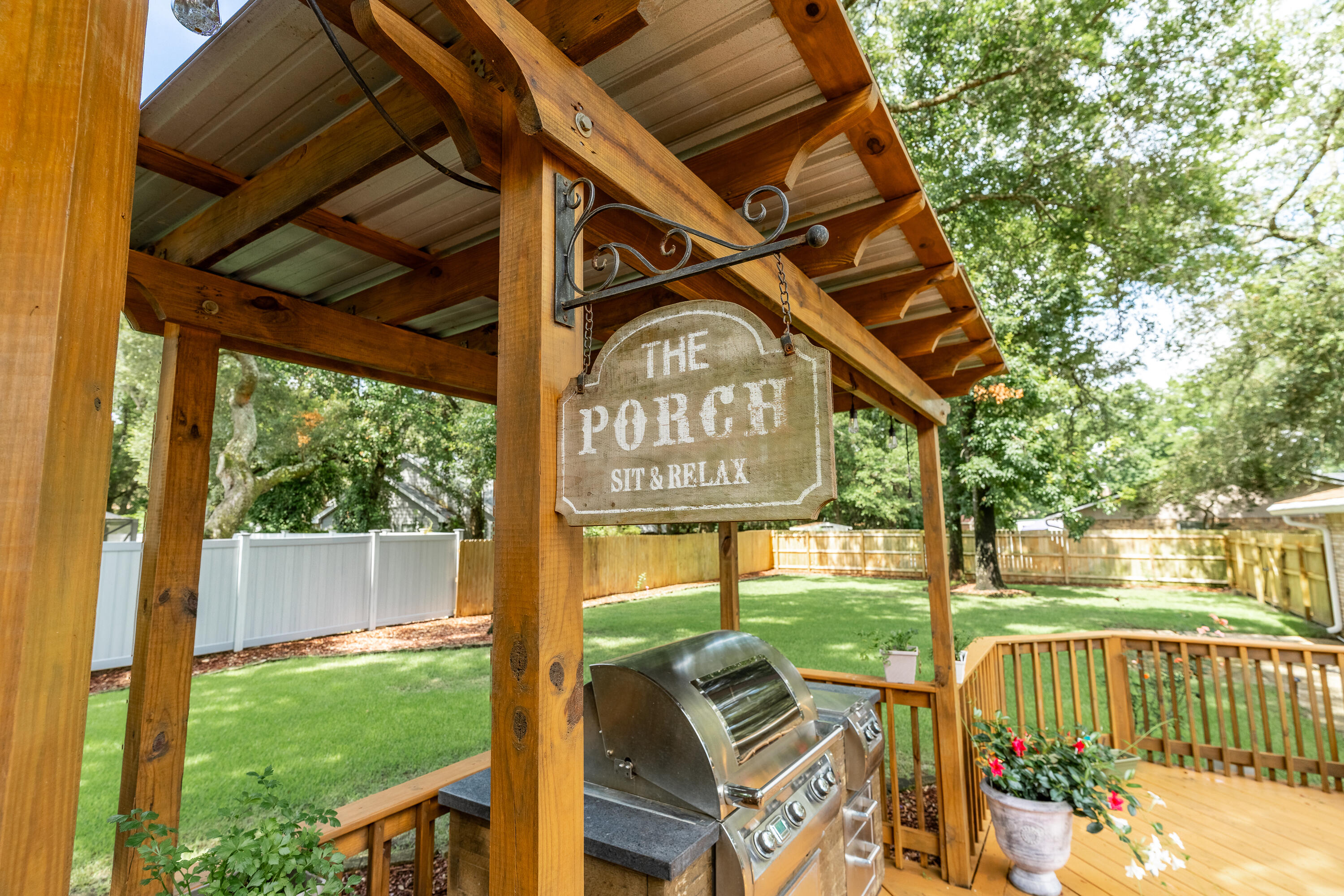 149 Raintree Boulevard Niceville, FL 32578 - Photo 53 of 72 a view of an chairs and tables in the patio