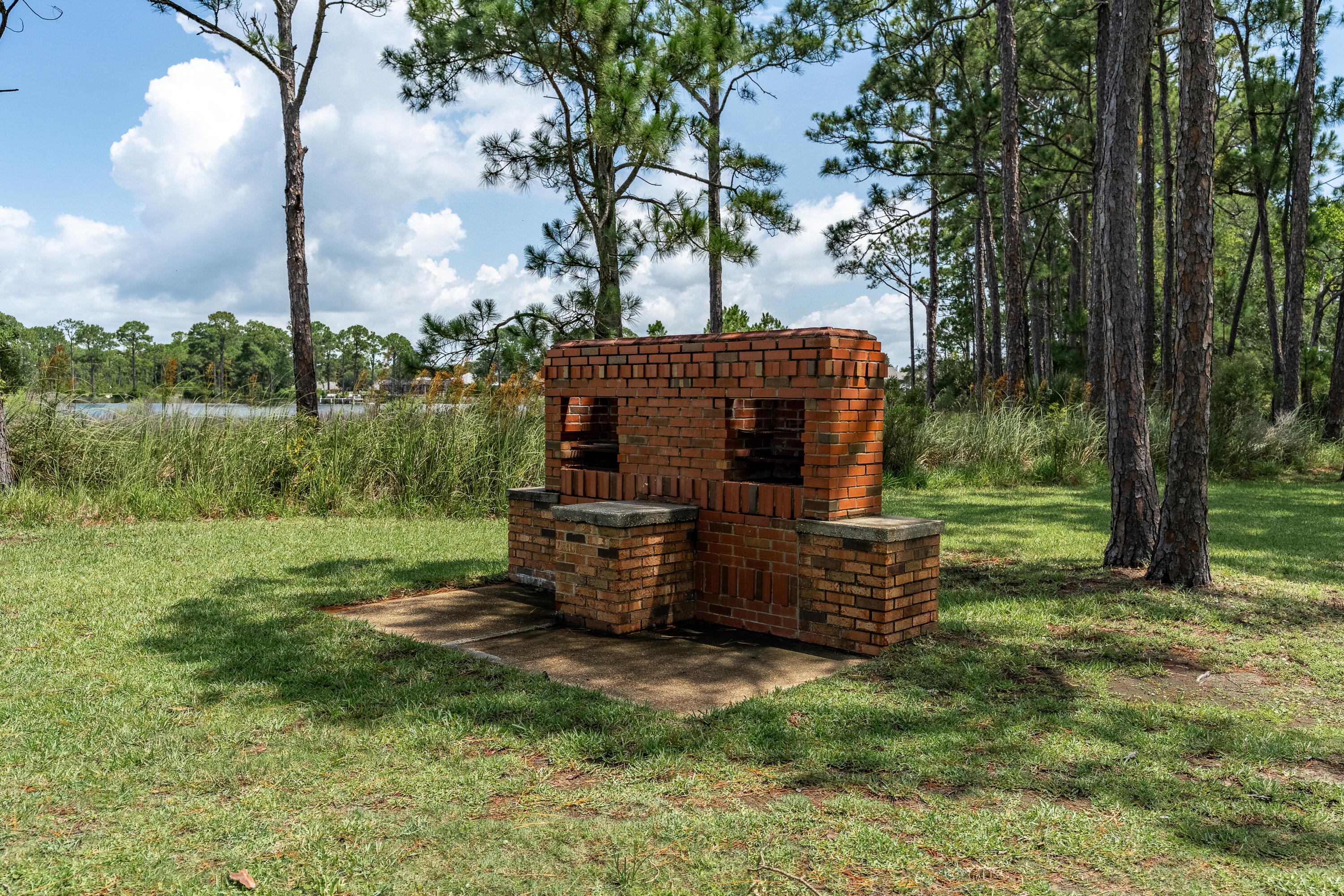 149 Raintree Boulevard Niceville, FL 32578 - Photo 67 of 72 a view of a garden