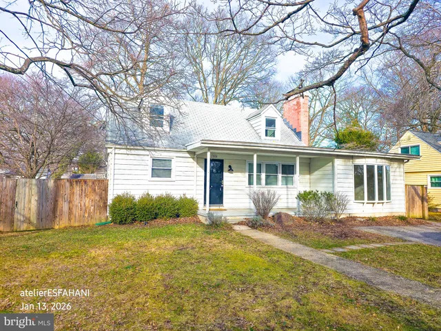 a front view of house with yard outdoor seating and barbeque oven