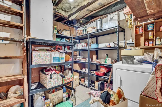 a store room with lots of furniture and a book shelf