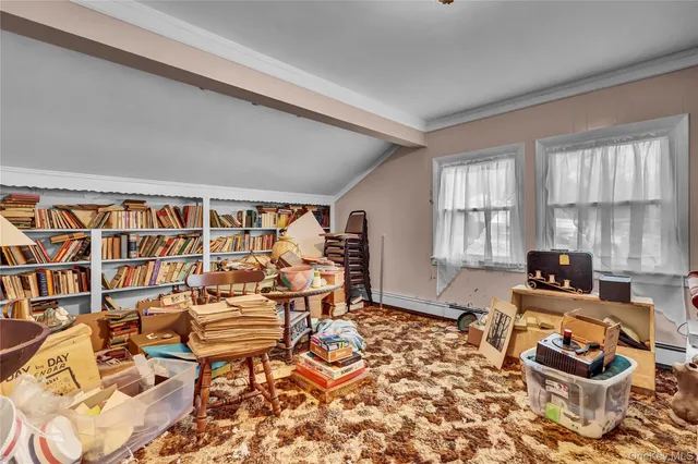 a living room with a couch and a table