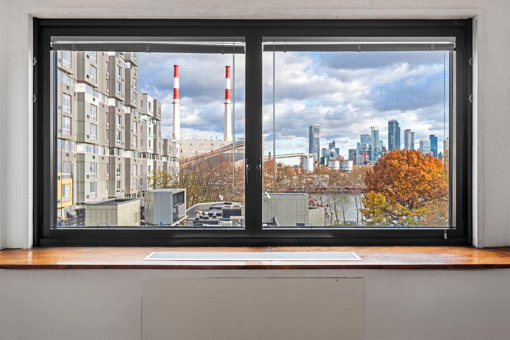 531 Main Street, Unit 504 Manhattan, NY 10044 - Photo 13 of 14 a view of a glass door with a large window