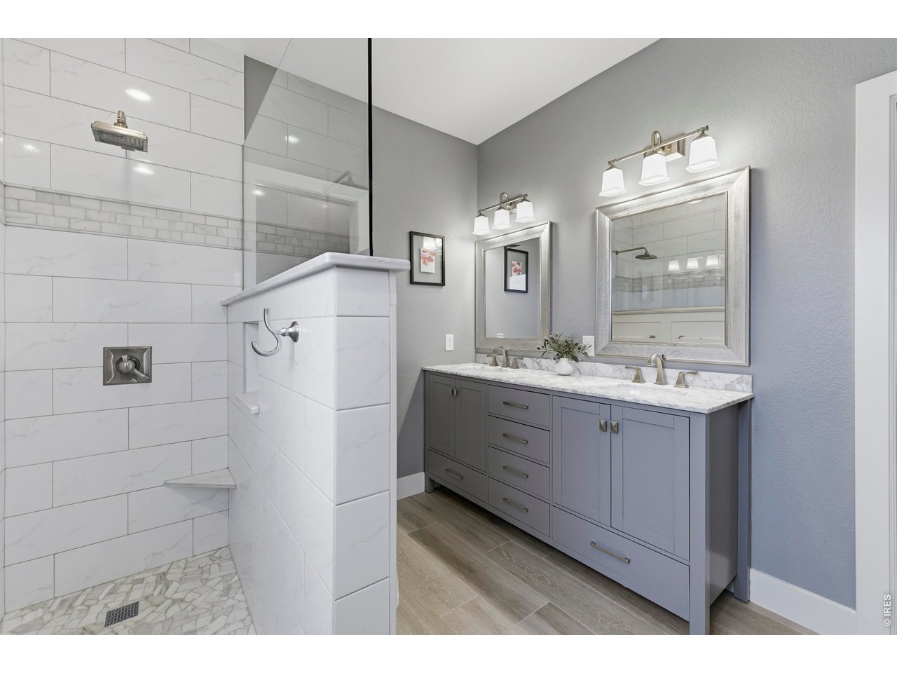 9734 Red Oakes Drive Highlands Ranch, CO 80126 - Photo 23 of 40 a bathroom with a double vanity sink mirror and shower