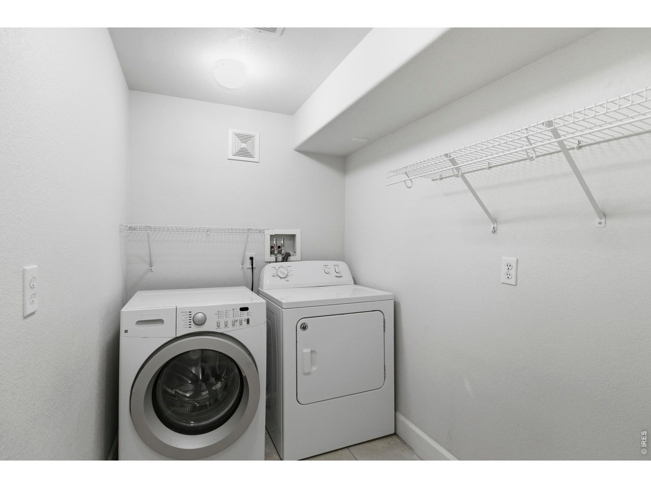 9734 Red Oakes Drive Highlands Ranch, CO 80126 - Photo 29 of 40 a utility room with dryer and washer