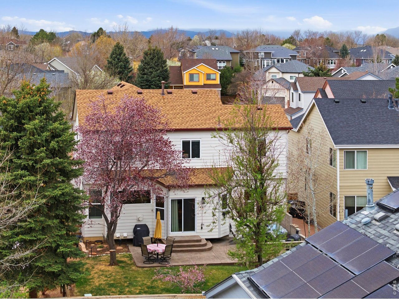 9734 Red Oakes Drive Highlands Ranch, CO 80126 - Photo 37 of 40 a aerial view of a house with a ocean view