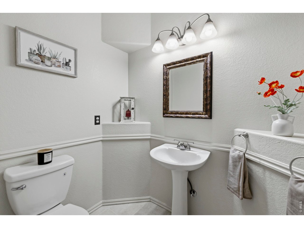 9734 Red Oakes Drive Highlands Ranch, CO 80126 - Photo 10 of 40 a bathroom with a sink mirror and toilet