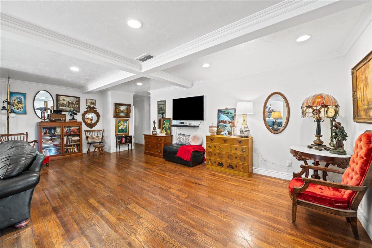 1244 Cimarron Circle Northeast Palm Bay, FL 32905 - Photo 12 of 38 a living room with fireplace furniture and a flat screen tv