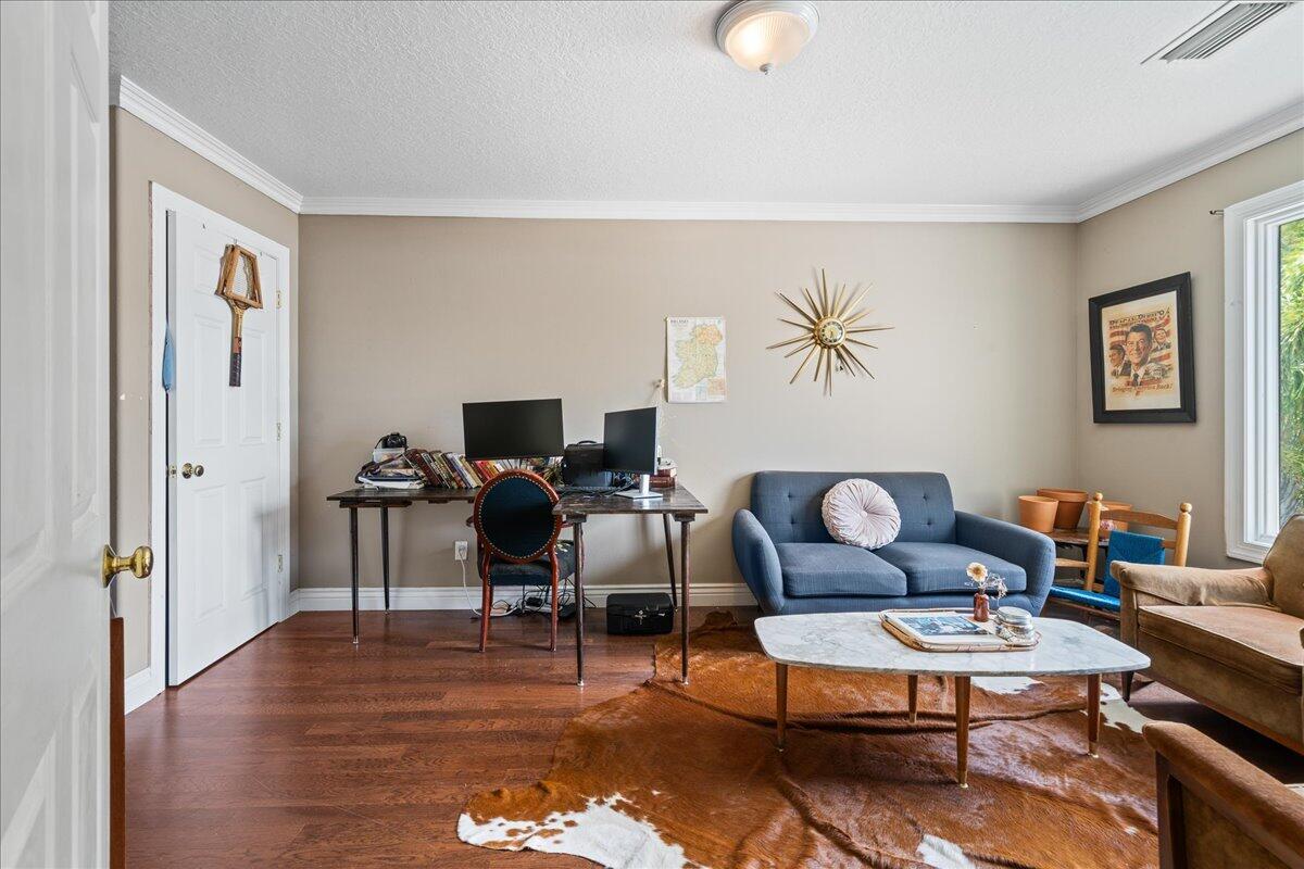1244 Cimarron Circle Northeast Palm Bay, FL 32905 - Photo 24 of 38 a living room with furniture