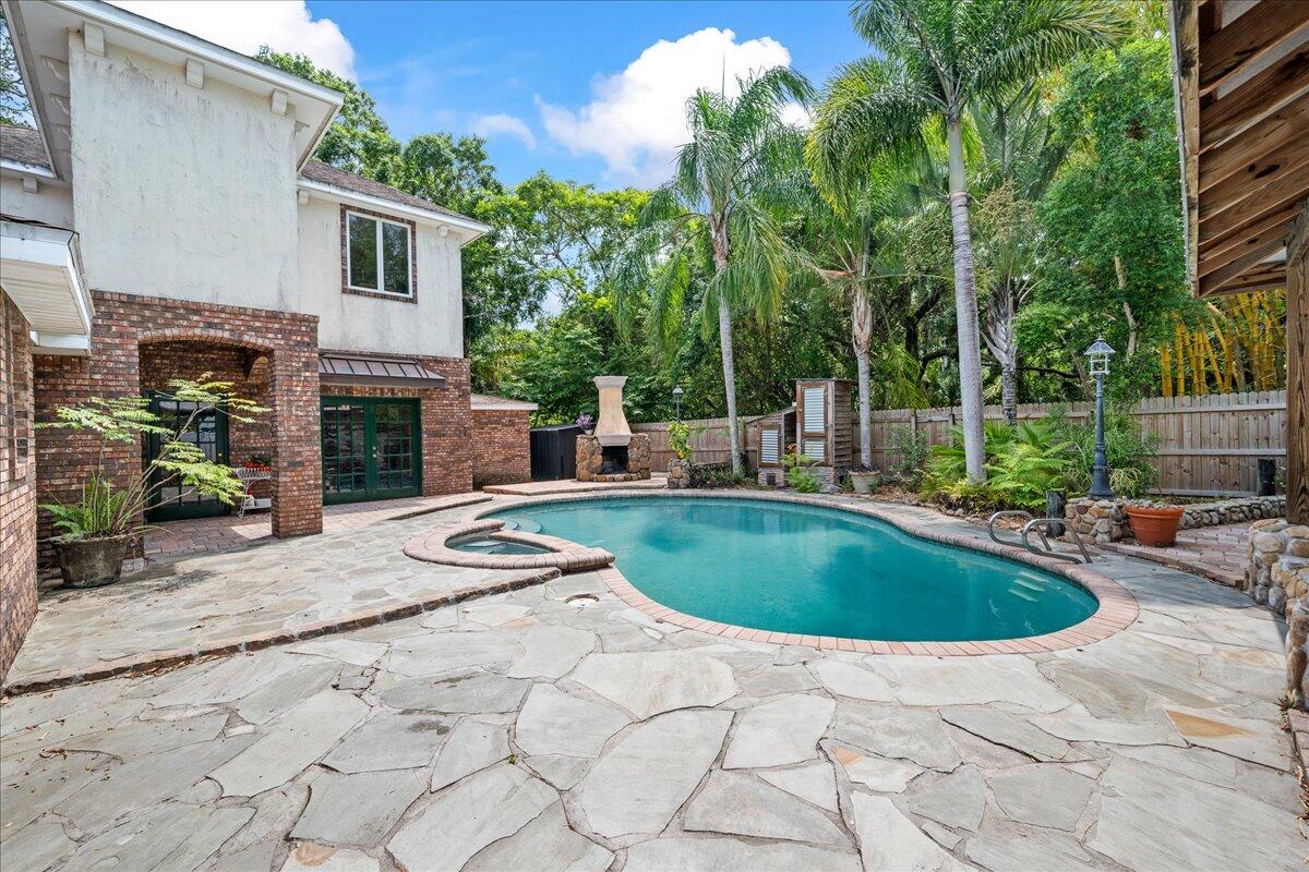 1244 Cimarron Circle Northeast Palm Bay, FL 32905 - Photo 30 of 38 a view of outdoor space yard swimming pool and patio