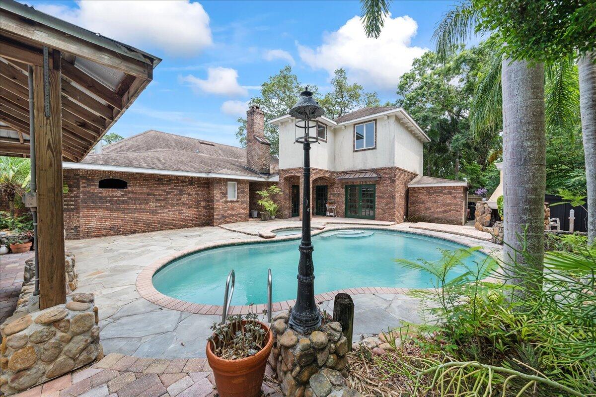 1244 Cimarron Circle Northeast Palm Bay, FL 32905 - Photo 33 of 38 a house view with a seating space
