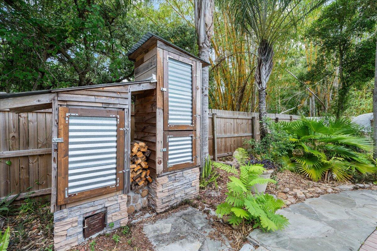 1244 Cimarron Circle Northeast Palm Bay, FL 32905 - Photo 34 of 38 a view of a house with a yard
