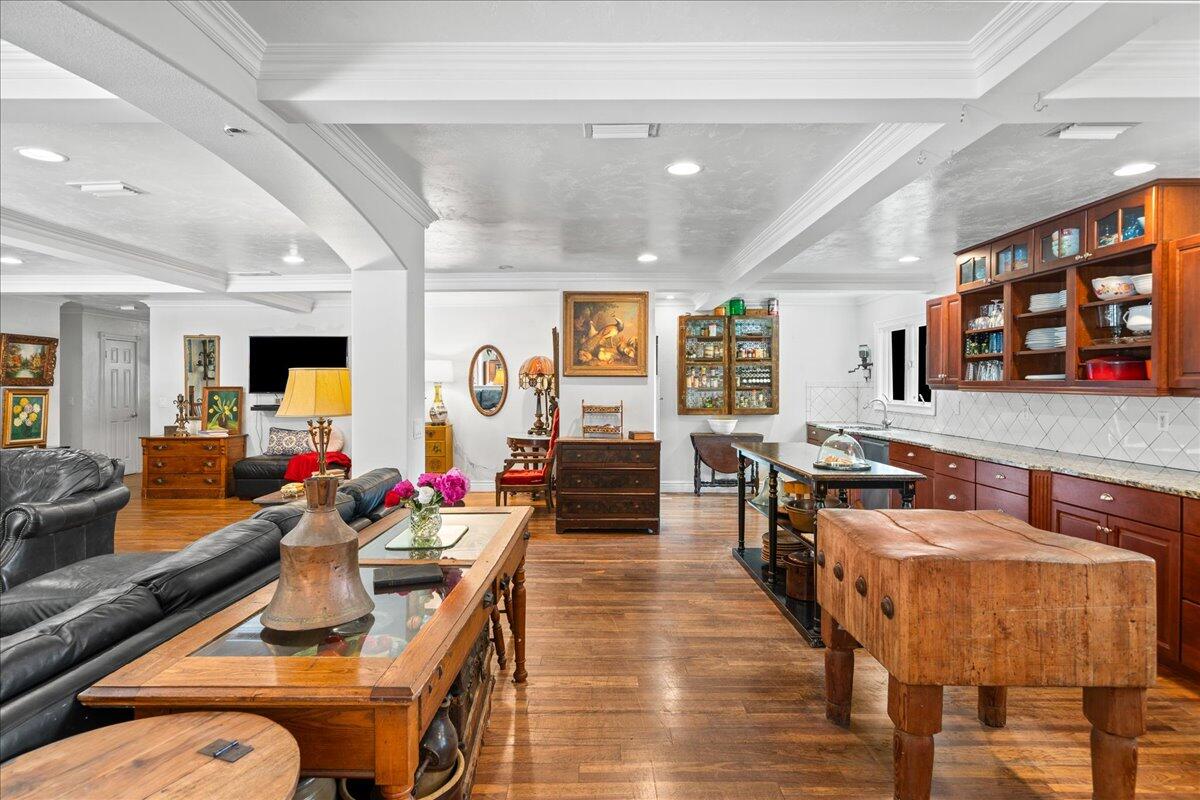 1244 Cimarron Circle Northeast Palm Bay, FL 32905 - Photo 8 of 38 a room with lots of furniture and flat screen tv