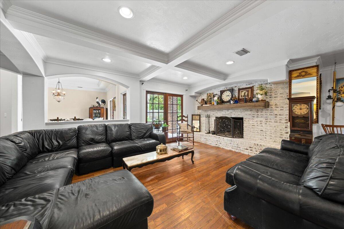 1244 Cimarron Circle Northeast Palm Bay, FL 32905 - Photo 10 of 38 a living room with furniture fireplace and flat screen tv