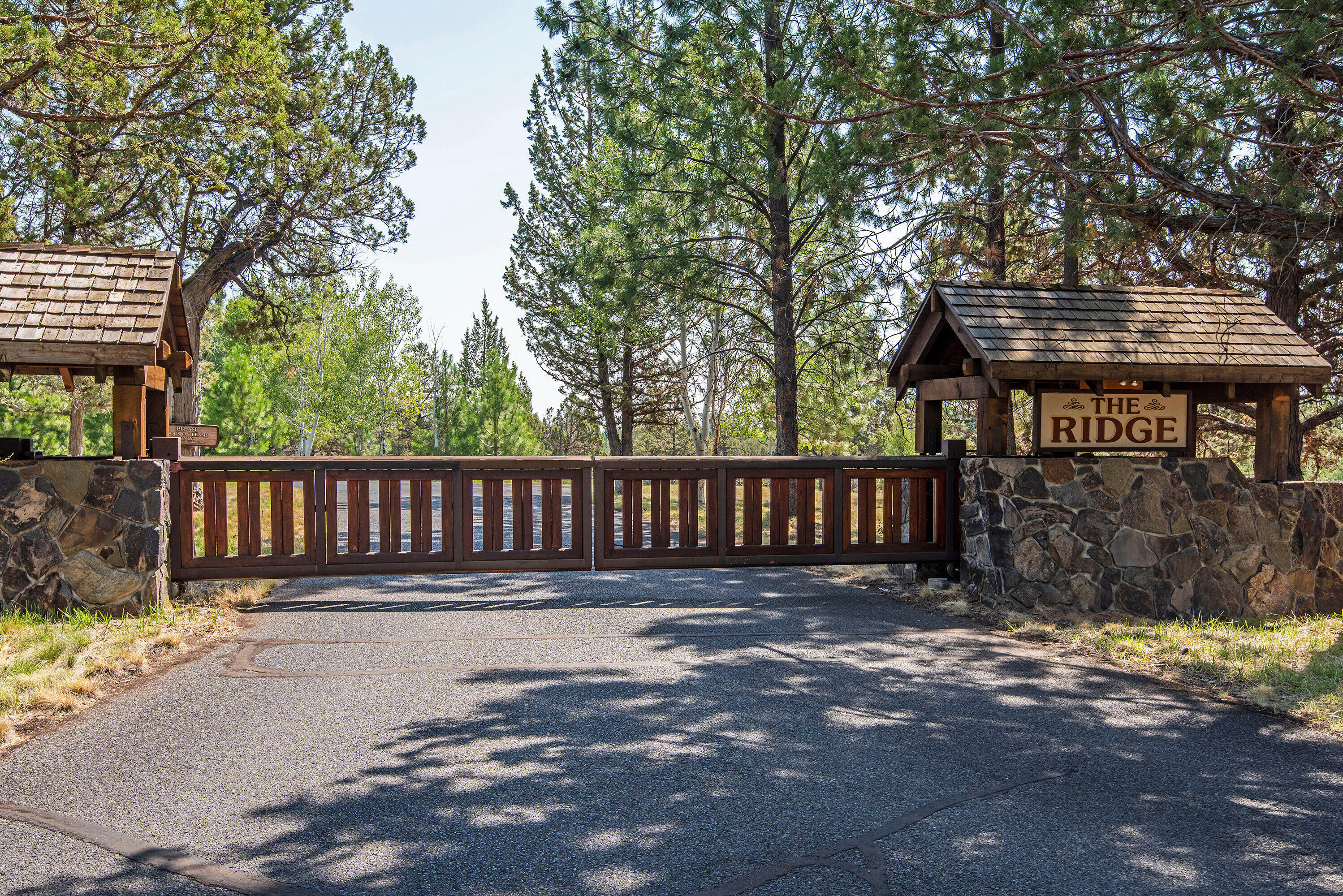 16065 Fox Ridge Circle Sisters, OR 97759 - Photo 2 of 16 a front view of a house with a bench