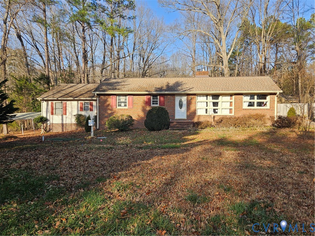 7866 Wilton Road, Unit 1 Henrico, VA 23231 - Photo 1 of 22 front view of a house with a yard