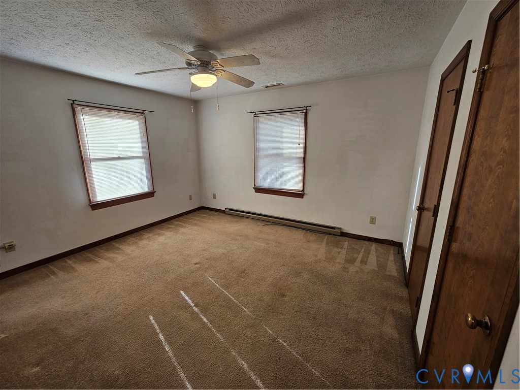 7866 Wilton Road, Unit 1 Henrico, VA 23231 - Photo 16 of 22 a view of an empty room with a window