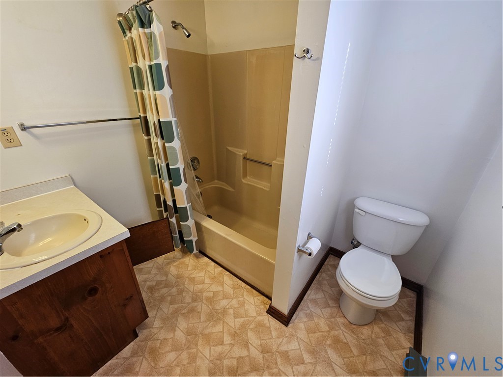 7866 Wilton Road, Unit 1 Henrico, VA 23231 - Photo 18 of 22 a bathroom with a toilet and a shower
