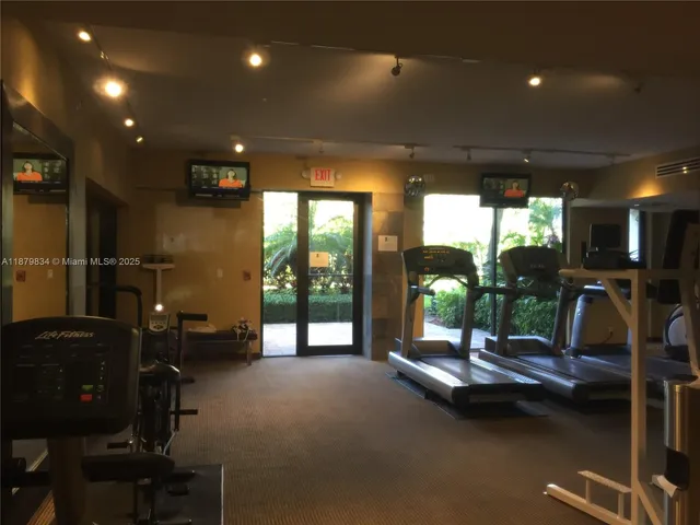 a view of a city that has lawn chairs plants