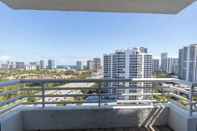 a tall building sitting on the side of a street