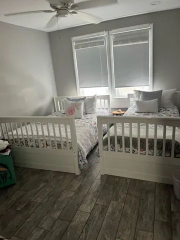 a view of a balcony with chairs
